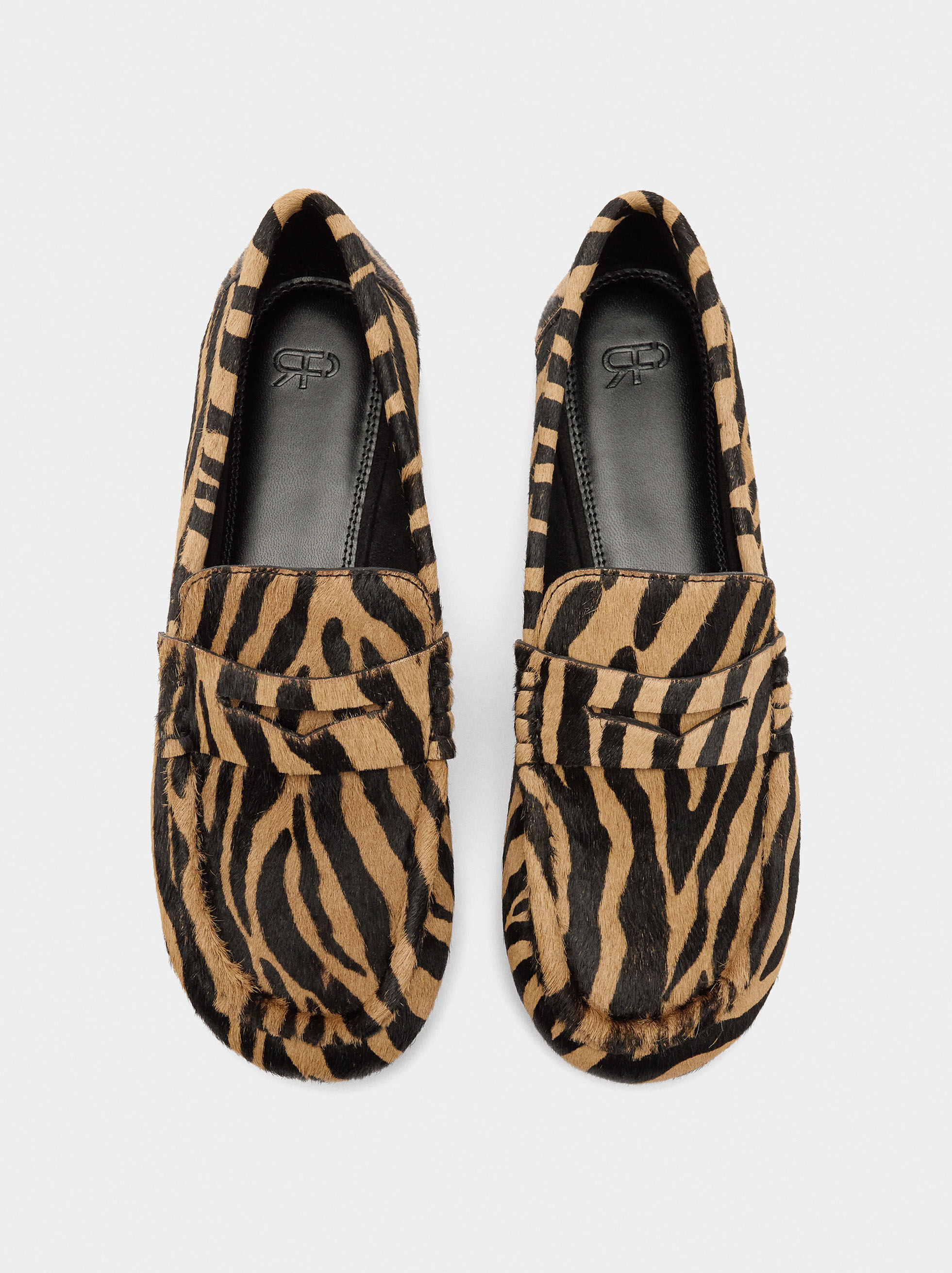 Mocasines de piel con estampado animal