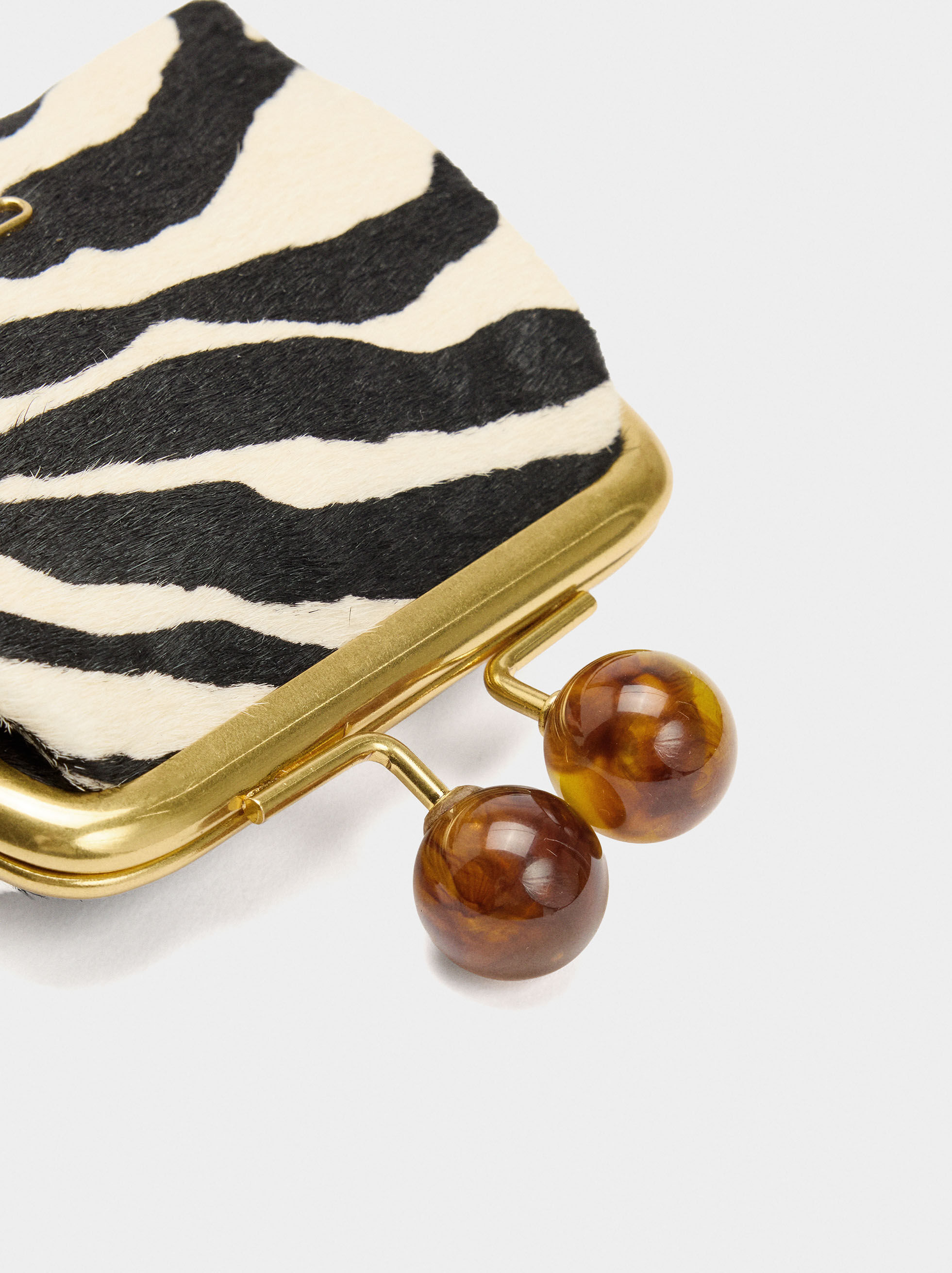 Bolso para monedas de piel con pelo y estampado animal