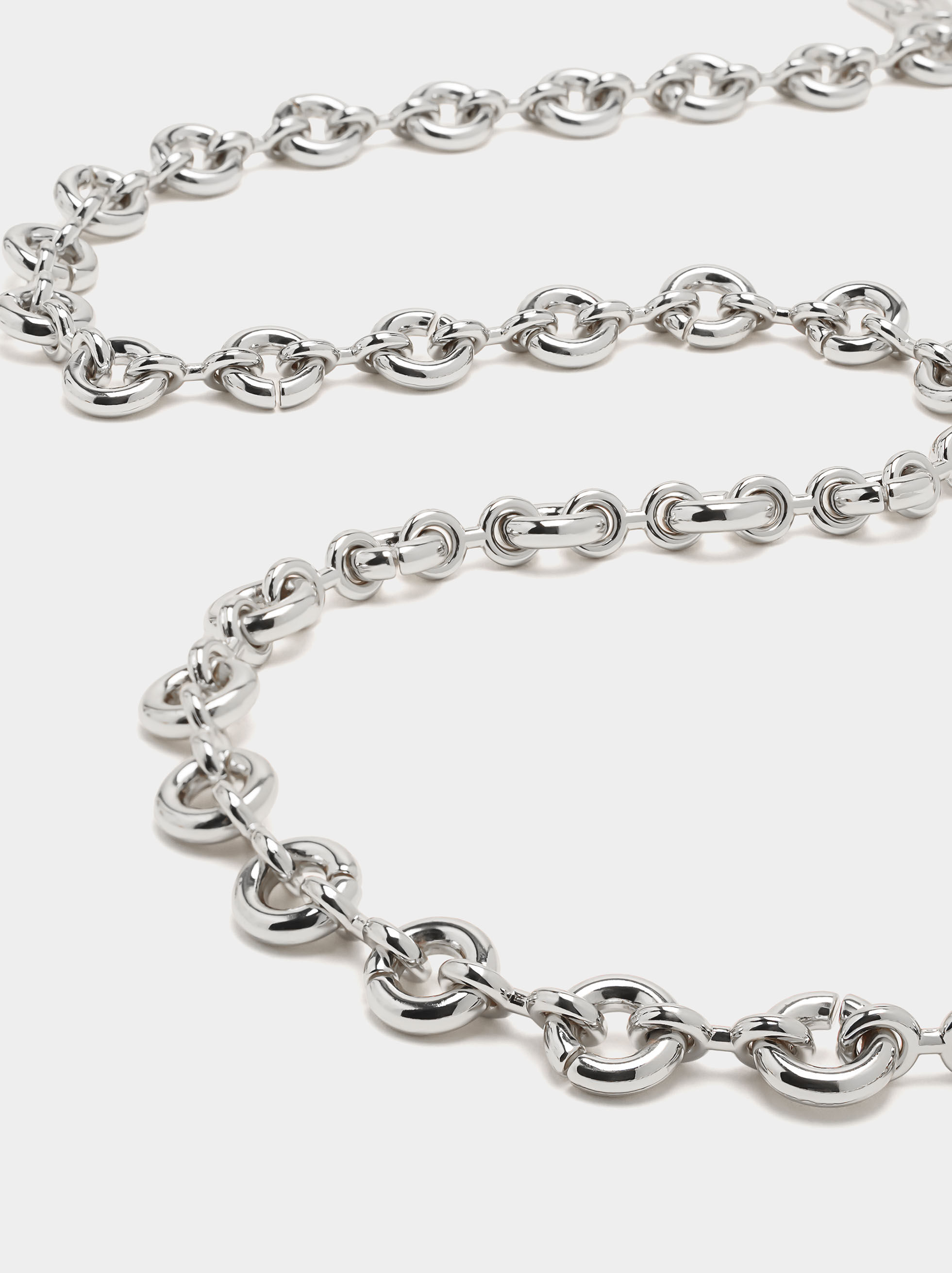 Cinturón metálico con aros