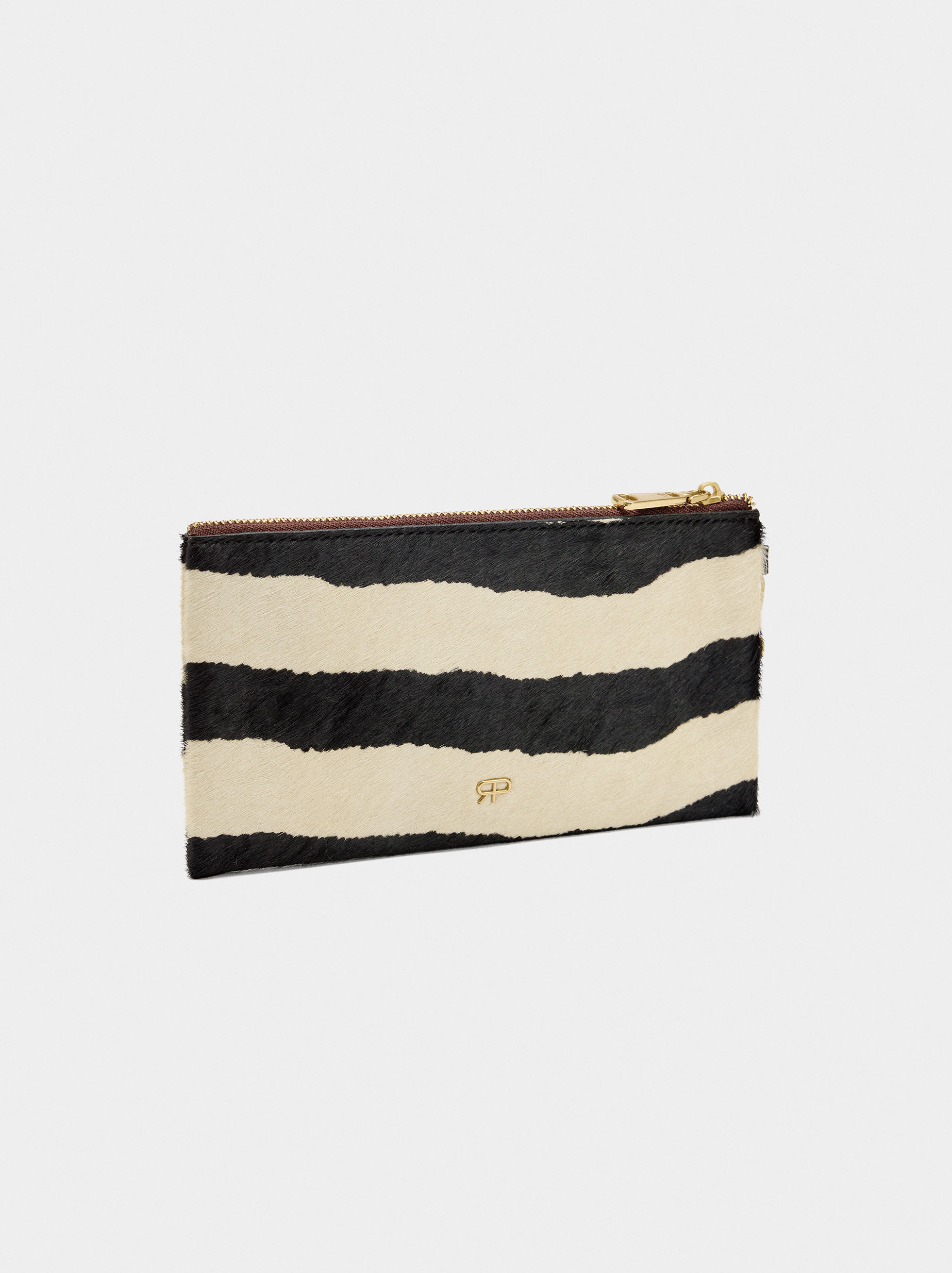 Bolso multifuncional de piel con pelo y estampado animal