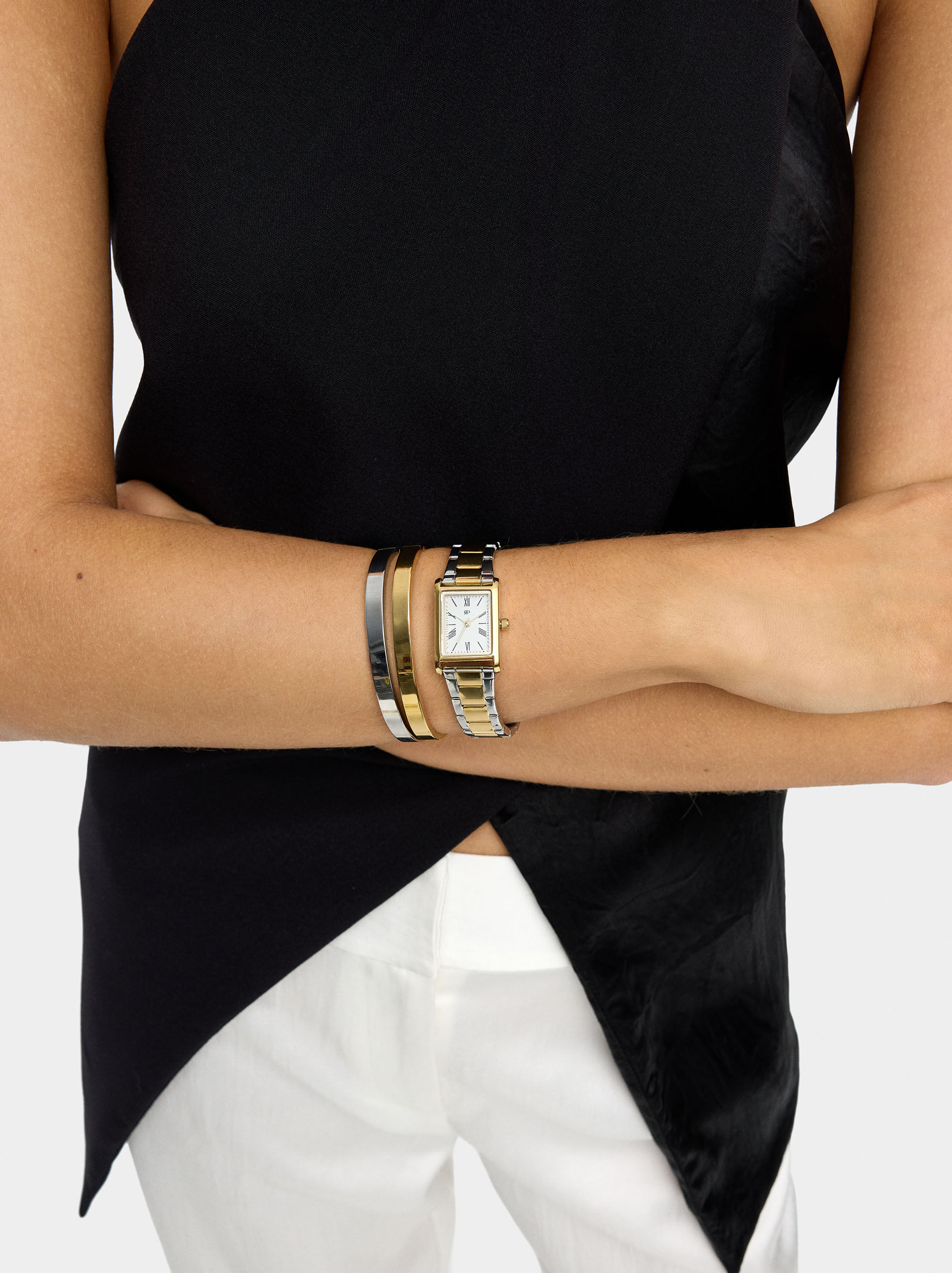Set de reloj con pulseras bicolor